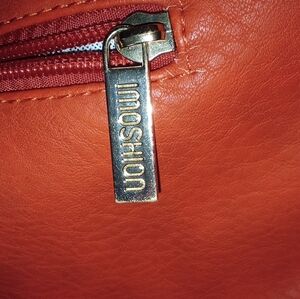 Red leather shoulder bag.